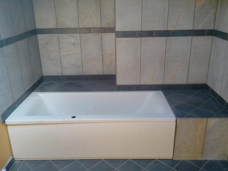 Ajustement de la baignoire et recouvrement extérieur